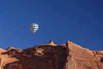 USA, Arizona, Monument Valley, Hot air balloons during Balloon Festival fly over the Navajo Tribal  Park.