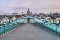 England, London, Early Sunday morning view of a quiet Millennium Bridge and the River Thames looking towards St Paul's Cathedral.