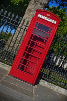 England, London, Greenwich, Iconic UK red telephone box.