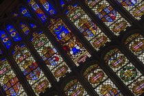 England, Richmond upon Thames. Hampton Court Palace, The Great Hall, 19th century stained glass window by Edward Jesse depicting Henry 8th.