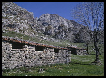 Spain, Asturias, Montana de Covadonga National Park  Sheperds Shelter  Stone built sheds with tiled roof.