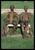 Art, Visual, Sculpture, Wicker figures sitting on a bench at Groombridge Place.