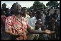 Burundi, Ruyigi, Hutu people return to thier burnt out village after the massacres of 1993 by government troops.