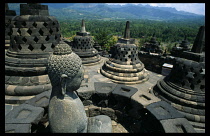 Indonesia, Java, Java Island, Seated Buddha at Borobudur temple complex