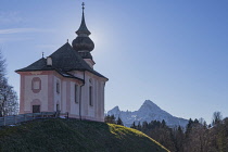 Germany, Bavaria, Maria Gern village near Berchtesgaden,  Pilgrimage Church of Maria Gern., rear view with the Watzmann Mountain in the background.