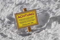 Germany, Bavaria, Berchtesgaden, Berchtesgadener Alps, Avalanche warning for skiers in 3 languages on the summit of the Jenner Mountain.