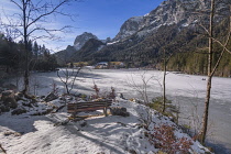 Germany, Bavaria, Berchtesgaden, Berchtesgadener Alps, Partially snow covered and frozen Lake Hintersee.