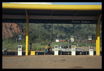 Brazil, Petrol station with cars being filled up with Sugar cane alcohol fuel.