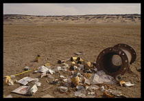 Environment, Litter, Pile of rubbish on the edge of the desert left by tourists, Bahariya Oasis, Egypt.