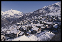 France, Savoie, St Martin de Belleville, Snow covered hillside town.