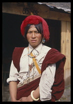 China, Tibet, People , Tibetan man from Khamba, head and shoulders portrait.