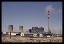 China, North , Industry, Coal Fired Power Station with plumes of smoke pouring from tall chimney.