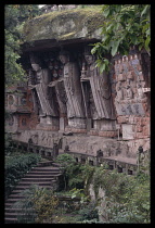 China, Sichuan Province, Dazu, Boading. Tang dynasty Buddhist figures sculpted within overhanging cliff. .