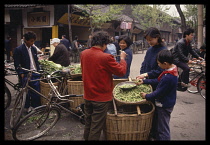 China, Chengdu, Peas for sale on market stall.