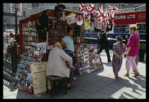 England, London, Picadilly Circus souvenir vendor.