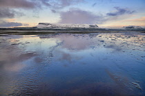 Ireland, County Sligo, Ben Bulben mountain with Rosses Point 3rd beach in the foreground.