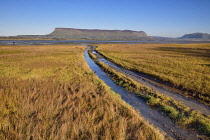 Ireland, County Sligo, Ben Bulben mountain with Rosses Point 3rd beach in the foreground on a clear winters day.