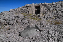 Ireland, County Sligo, Castlebaldwin, Carrowkeel Megalithic Cemetery, Facade of one of the cairns known as Cairn H with entrance doorway visible..