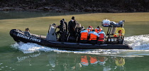 England, Kent, Dover, Border Force officers landing Asylum Seekers picked up in the English Channel.
