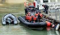 England, Kent, Dover, Border Force officers landing Asylum Seekers picked up in the English Channel.