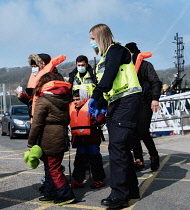 England, Kent, Dover, Border Force officers landing Asylum Seekers picked up in the English Channel.