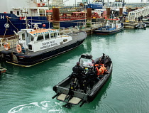 England, Kent, Dover, Border Force officers landing Asylum Seekers picked up in the English Channel.