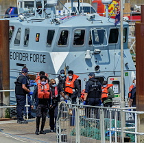 England, Kent, Dover, Border Force officers landing Asylum Seekers picked up in the English Channel.