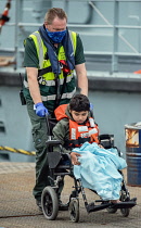 England, Kent, Dover, Border Force officers landing Asylum Seekers picked up in the English Channel.