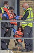 England, Kent, Dover, Border Force officers landing Asylum Seekers picked up in the English Channel.