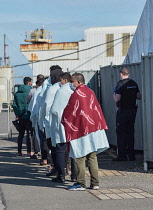 England, Kent, Dover, Border Force officers landing Asylum Seekers picked up in the English Channel.