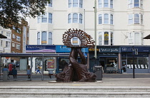 England, East Sussex, Brighton, Norfolk Square, Waves of Compassion Sculpture created by Steve Geliot, formed of three original Old Steine dolphins, which were designed by Amon Henry Wilds as part of...