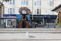 England, East Sussex, Brighton, Norfolk Square, Waves of Compassion Sculpture created by Steve Geliot, formed of three original Old Steine dolphins, which were designed by Amon Henry Wilds as part of...