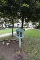 England, East Sussex, Brighton, Norfolk Square, Book Swap cabinet in public park.