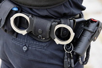 Law & Order, Crime, Police, Detail of police officers belt with handcuffs etc.