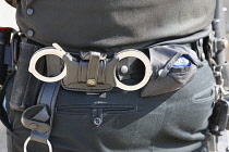 Law & Order, Crime, Police, Detail of police officers belt with handcuffs etc.