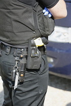Law & Order, Crime, Police, Detail of police officers belt with handcuffs etc.