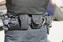 Law & Order, Crime, Police, Detail of police officers belt with handcuffs etc.