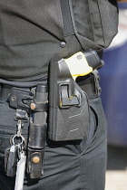 Law & Order, Crime, Police, Detail of police officers belt with handcuffs etc.