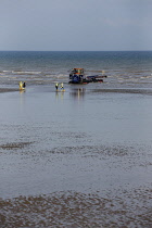 England, Kent, Dungeness, RNLI land crew bringing in the lifeboat.