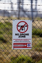 England, Kent, Dungeness, No Drone sign on the fence around the Nuclear Power Station.