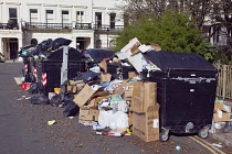 England, East Sussex, Hove, Overflowing bins during refuse collectors strike.