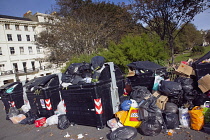 England, East Sussex, Hove, Overflowing bins during refuse collectors strike.