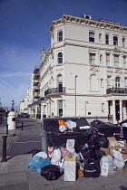 England, East Sussex, Hove, Overflowing bins during refuse collectors strike.