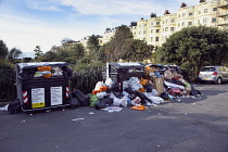 England, East Sussex, Hove, Overflowing bins during refuse collectors strike.