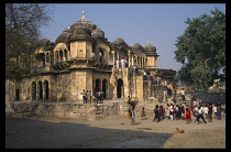 India, Rajasthan, Ramgarh, Temple school with group of children gathered outside..