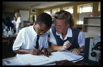 South Africa, Gauteng, Johannesburg, Mixed race pupils in classroom.
