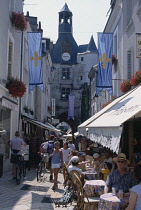 France, Loire, Amboise, Narrow street with cafes in the old town, which was the last home of Leonardo da Vinci.