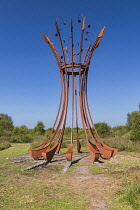 Ireland, County Offaly, Lough Boora Discovery Park, an artwork by Caroline Madden titled Cycles, consisting of old train rails it represents the cyclical nature of land and mankind's interaction with...