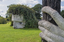 Ireland, County Westmeath, Moate, Dun na Si Heritage Park, The mythological god Lugh clasps his famous spear.