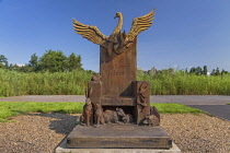 Ireland, County Roscommon, Roscommon town, Loughnaneane Park Sculpture Trail at Roscommon Castle, The Nature Chair wood carving by Richie Clarke, it reflects the wildfowl and animals that are native t...